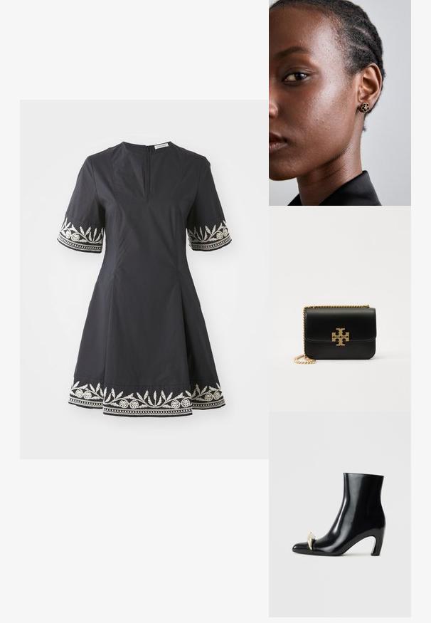 Svart klänning med en åtsittande bodice, utsvängt kjol och korta ärmar med intrikat broderade vita blommönster vid ärmsluten och kanten.; Svarta ankelstövlar i glänsande läder, med spetsig tå och en dekorativ guld- och silverdetalj framtill. Blockklackdesign.; Svart läderhandväska med kedjesadel i guldfärg och logotypdetalj. Har en rektangulär form med en vikbar klaff. Slät textur.; Guldblommig studsmycke har en texturerad svart mitt och delikat utsmyckning. Modellen har klart skinn och flätat hår, synligt i profil.