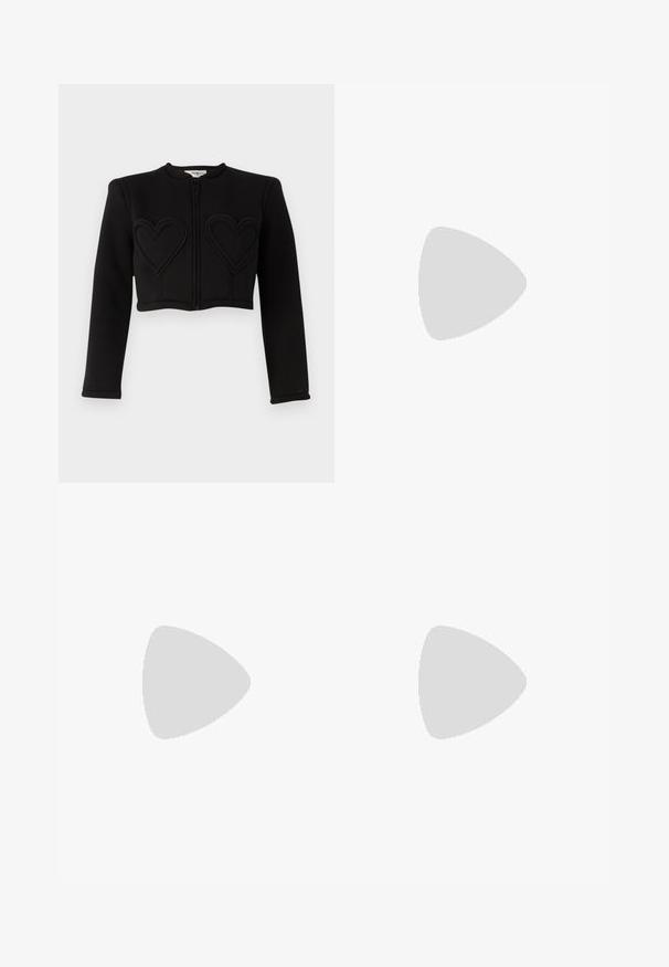 Black cropped jacket with long sleeves, featuring two stitched heart patterns on the front and a front zipper closure. Smooth texture.; White ribbed short-sleeve T-shirt with a crew neck. The fabric appears smooth with a fitted silhouette. Branding label visible at the collar.; Black jogger pants with elastic waistband and drawstring, ribbed cuffs, and subtle logo detail on the side leg.; Black leather ballet flat with a rounded toe, smooth texture, minimal stitching detail, and a flexible sole design.