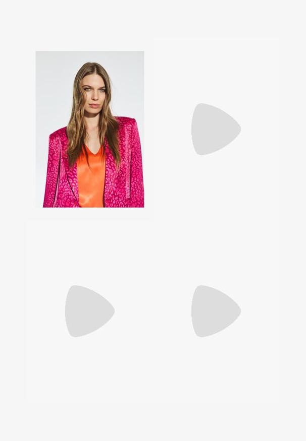 Pink leopard print blazer with structured shoulders, paired with a bright orange satin top. Model has long, wavy hair, set against a neutral background.; Black cotton T-shirt with a relaxed fit, short sleeves, rounded neckline, and a smooth texture. No visible patterns or accents.; Stradivarius Trousers - black; Stradivarius WITH BUCKLE - Classic heels - black