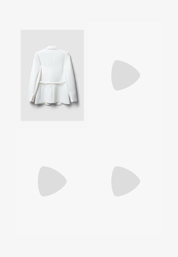 White blazer with a tailored design, featuring a notch lapel, long sleeves, and a belted back detail. Smooth fabric with a structured silhouette.; White short-sleeve t-shirt made from smooth fabric, featuring a round neckline and subtle stitching details at the hem.; Light blue wide-leg jeans made of denim, featuring a high waist, front pockets, and a button closure. Smooth texture with faded areas.; White athletic shoe with mesh upper, navy accents, and cushioned sole. Features "N" logo, laces, and textured detail on side.