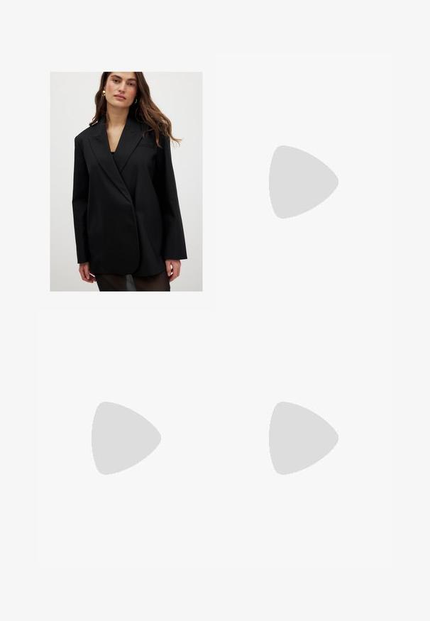 Black blazer with a structured fit, peak lapels, long sleeves, and a single-button closure. Smooth fabric with minimalistic design accents.; Black sleeveless crop top made of smooth fabric, featuring a round neck and a clean, simple design without patterns or hardware.; Black trousers with a straight fit, featuring front pockets and side slits at the hem. Made of soft, smooth fabric. Suitable for various occasions.; Black flat sandals featuring a glossy finish, three thin straps, and a circular hardware detail at the toe. Sleek design with a minimal heel.
