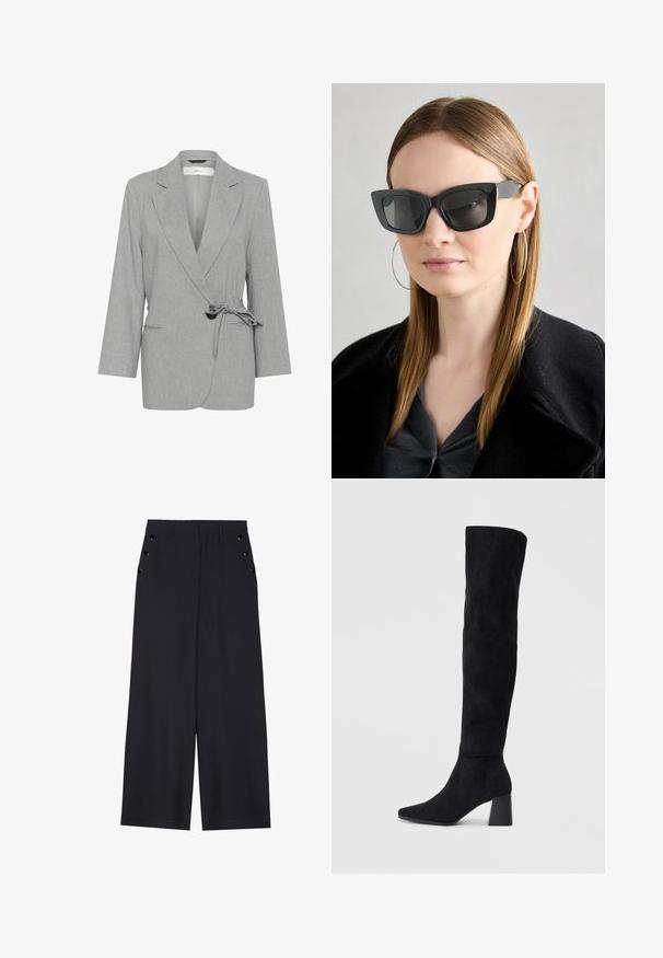 Szary, teksturowany żakiet o fasonie kopertowym, z długimi rękawami i wiązanym w pasie. Posiada dwie przednie kieszenie oraz klapy typu notch.; Czarny top z długim rękawem, z rozkloszowanymi mankietami, miękką fakturą i luźnym krojem, z prostym okrągłym dekoltem.; Spodnie o szerokich nogawkach w ciemnonawowej tkaninie, charakteryzujące się gładką teksturą, plisami z przodu oraz dekoracyjnymi oczkami w kolorze złotym na kieszeniach bocznych.; Czarne zamszowe botki do kolan na kwadratowym obcasie, z wydłużonym noskiem i gładkim, bezszwowym wzorem na jednolitym jasnym tle.; Czarne okulary w kocim kształcie z ciemnymi soczewkami, grubymi oprawkami i subtelnymi akcentami. Noszone z czarnym płaszczem i szarym topem, z długimi prostymi włosami.