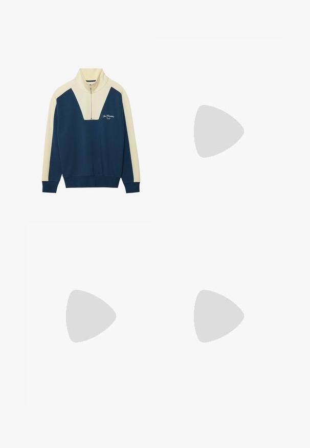 Marinblå och krämfärgad tröja med halvdraperad krage, med en V-formad design och logotyptext på bröstet. Mjuk bomullsblandning.; Vita bomull T-shirts, korta ärmar, rundad halsdesign, slät textur, staplade i en rad, med subtil branding vid halsringningen.; Selected Homme SLH SLIM TAPE BRODY PANT - Tygbyxor - dark sapphire; Vita lädersneakers med grå mockatoe, tre horisontella vita ränder, blå accenter och brun gummisula. Texturerad detalj på sulan.