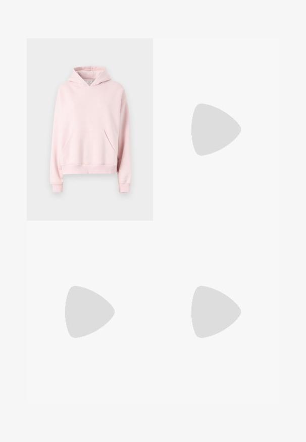 Light pink hoodie made of soft fabric. Features a front pocket, ribbed cuffs, and a drawstring hood. Simple, relaxed design.; Light pink sweatpants made of soft fabric, featuring an elastic waistband with a drawstring and a flared leg design.; White leather sneaker with perforated toe box, textured sole, and white laces, paired with wide red pants and a blue and yellow background.; Olive green corduroy handbag with two front pockets, gold hardware, and a short strap. Worn with a light green striped sweater.