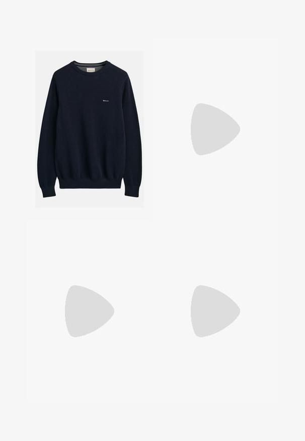 Pulover tricotat bleu marin cu un model texturat, guler rotund, manșete și tiv ondulat, având un mic logo alb pe piept.; Pantaloni bej cu croi drept, dotati cu un singur nasture negru, bucle pentru centură și buzunare laterale. Textură de țesătură netedă și design minimal.; Pantofii de alergare negri cu partea superioară din plasă și materiale sintetice, talpă flexibilă și șireturi elastice. Au un intermediar căptușit pentru confort.; Ochelari de soare pătrați negri, cu lentile întunecate, finisaj mat și accente de metal auriu pe templu, având un design minimalist.