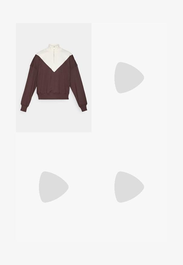 Sudadera de media cremallera en marrón y crema con un diseño de bloques de color en forma de V, puños acanalados y una textura suave.; Camiseta negra de manga corta hecha de una mezcla de algodón, con cuello redondo y textura suave, sin logotipos o patrones visibles.; Leggings negros de tejido elástico, con cintura alta, piernas ajustadas y puños en los dobladillos, con una textura suave y mate.; Zapatilla deportiva blanca con una parte superior de punto texturizado, una mediasuela blanca lisa y una suela de goma con un patrón sutil.
