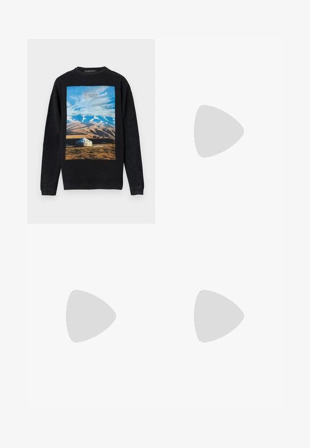 Black sweatshirt featuring a colorful graphic of mountains and a tent. Made of soft material, with a round neckline and ribbed cuffs.; Distressed denim jeans in light green, featuring a straight leg, five-pocket design, and uneven fading with paint splatters.; Black leather loafers with a smooth texture, rounded toe, and a decorative strap across the vamp. Low stacked heel, minimalist design.; Black rectangular sunglasses with dark lenses, thick plastic frame, gold accents on temples, and brand logo engraved on the arm.