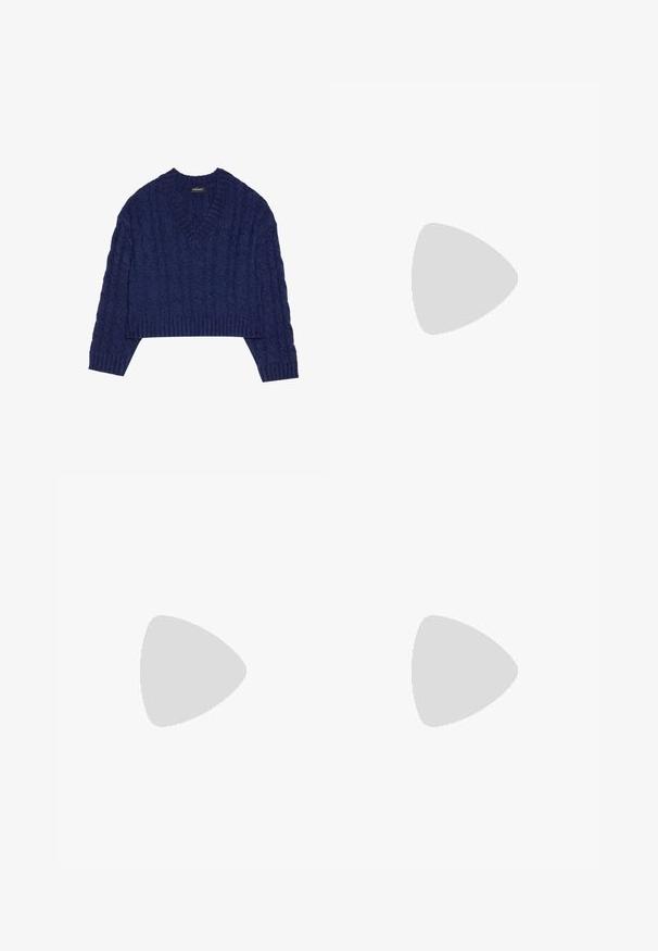 Navy blue cropped sweater with a V-neck, featuring a textured cable knit pattern and ribbed cuffs and hem. Made from knitted fabric.; Light blue denim wide-leg pants featuring large front pockets, contrast stitching, and a button closure at the waist.; White high-heeled sandal with a chunky heel, featuring a strappy design and ankle tie. Smooth texture with a platform front for added height.; White shoulder bag with a textured finish, a central buckle accent, and a curved shape. Zipper closures on both sides.