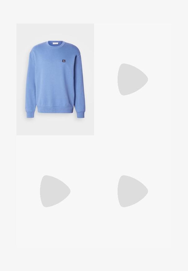 Light blue crewneck sweatshirt, made of soft material, featuring ribbed cuffs and hem, with a small logo patch on the upper left side.; White cotton t-shirt with a round neck and short sleeves, featuring a small Calvin Klein logo in a contrasting color on the chest.; Beige cotton jeans with a classic straight-leg design, featuring a front button closure, five pockets, and subtle stitching details.; Blue suede sneaker with white rubber sole, lace-up design, rounded toe, and contrasting tan interior. Subtle stitching details.