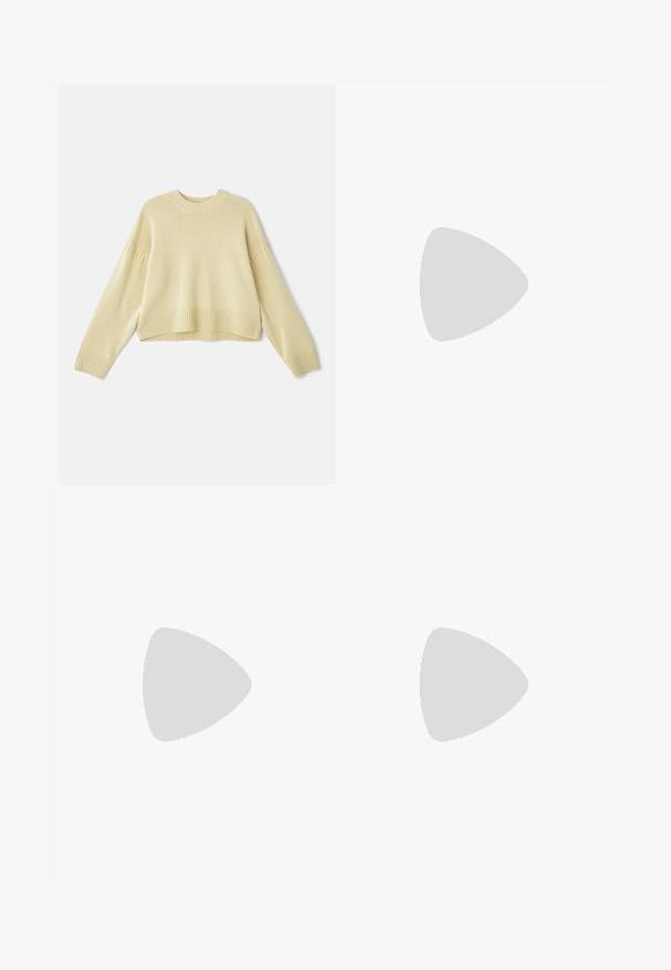 Vanessa Bruno ESTHER - Strickpullover - jaune; Weite braune Jeans aus Denim, mit hoher Taille, Fronttaschen und klassischem Knopfverschluss. Glatte Textur mit feinen Nähten.; Braune und burgunderfarbene Sneaker aus Wildleder und Mesh-Materialien, mit drei cremefarbenen Streifen, strukturiertem Stoff an der Zunge und einer Gummisohle.; Braune Ledertasche mit strukturierter Oberfläche, einem einzelnen Schulterriemen und einem dezenten Logo auf der Vorderseite. Verfügt über ein strukturiertes Design.