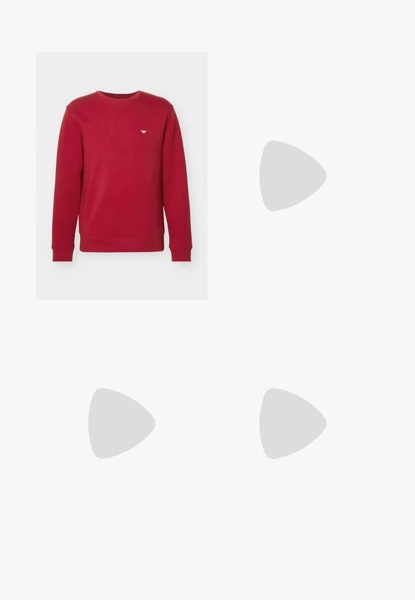 Emporio Armani Sweatshirt - rio red; Dark blue denim jeans with slim fit, slight distressing on thighs and knees, classic five-pocket design, and button closure.; White leather sneaker with a smooth surface, round toe, and minimalistic design. Features beige accents on the heel and a rubber sole.; Black Emporio Armani crossbody bag with front zipper pocket, adjustable strap, and logo detail on textured fabric.