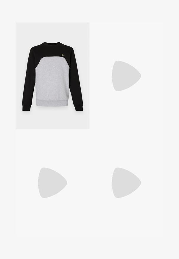 Felpa grigia e nera con scollo rotondo, maniche lunghe e polsini a costine. Presenta un design a pannelli contrapposti e un piccolo logo.; Pantaloni della tuta azzurro chiaro realizzati in tessuto morbido, con un design affusolato, vita elasticizzata e orli a costole. Piccolo logo sul lato.; Sneaker Lacoste grigie scure in materiale mesh e sintetico, con suola testurizzata e dettagli marroni sul colletto e sul branding.; Marsupio in stampa tie-dye blu scuro con una parte superiore con zip, materiale testurizzato e un logo ben visibile sul davanti.