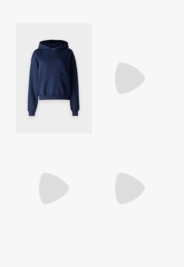 Gina Tricot Petite BASIC ORIGINAL HOODIE - Sweatshirt - dark blue; Denim flared jeans in dark blue with a smooth texture, five-pocket design, and a button closure at the waist.; Black leather ankle boots with a round toe, lace-up front, and a thick rubber sole featuring a textured tread. Pull tab at the back.; Gold hoop earrings with a smooth, shiny finish. Circular design featuring a small post and clear backing for secure wear.