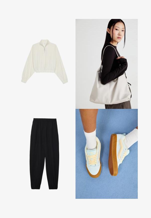 Skórzany pulower w kolorze kremowym, z wysokim kołnierzem, półzamkiem, elastycznym wykończeniem u dołu i mankietami, o gładkiej teksturze i minimalistycznym designie.; Czarne, lekkie spodnie z elastycznym pasem i ściągaczami na kostkach. Materiał jest gładki i ma luźny, zwężany krój.; Jasnoniebieskie trampki z kremowymi akcentami, z sznurowadłami, gumową podeszwą i teksturowanym bieżnikiem. Noszone z białymi skarpetami na niebieskiej powierzchni.; Beżowa torebka wykonana z miękkiego materiału, charakteryzująca się luźnym fasonem, wyszywanymi detalami i dwoma uchwytami na ramię. Idealna na co dzień.