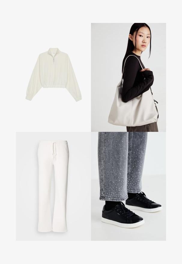 Pullover court en tissu crème, avec un col haut, fermeture éclair à mi-hauteur, ourlet et poignets élastiqués, offrant une texture lisse et un design minimaliste.; Pantalons de jogging blancs, à coupe décontractée, fabriqués en tissu doux, dotés d'une taille élastique avec cordon de serrage et d'une conception à jambe droite.; Baskets en cuir noir avec semelles en caoutchouc blanc et accents texturés. Associées à un jean en denim gris orné de points argentés embellis.; Sac à main beige en matériau souple, avec un design décontracté, des détails cousus et deux poignées. Idéal pour un usage quotidien.