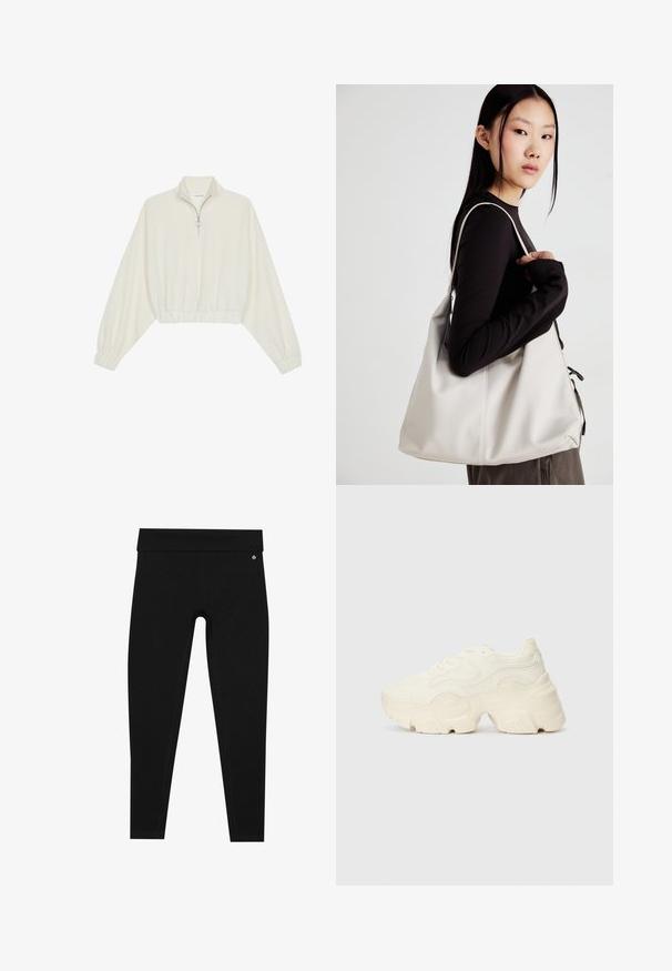Pullover accorciato in tessuto crema, con colletto alto, chiusura a zip parziale, orlo e polsini elasticizzati, dalla texture liscia e design minimal.; Leggings neri con vita alta. Realizzati in un materiale liscio e elastico con cuciture piatte e un piccolo logo vicino alla vita.; Sneakers bianchi chunky realizzati in mesh testurizzato e materiali sintetici, dotati di una suola spessa e dettagli con motivi intricati lungo i lati.; Borsa a mano beige realizzata in materiale morbido, caratterizzata da un design morbido, dettagli cuciti e due manici. Adatta per l'uso quotidiano.