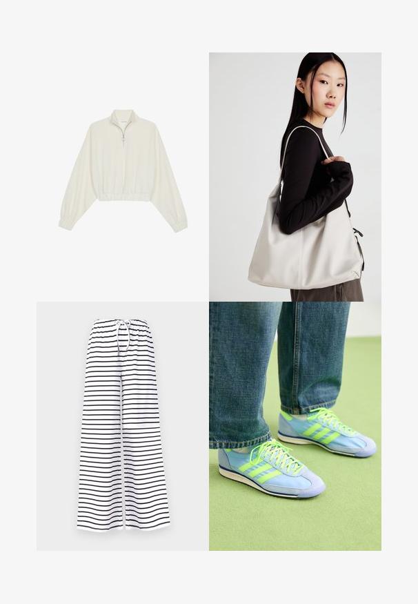 Pullover curto em tecido creme, apresentando um colarinho alto, fecho de meio zíper, bainha e punhos elásticos, com uma textura suave e design minimalista.; Calças de perna larga em tecido branco, com riscas horizontais pretas. Cintura elástica com cordão para um ajuste e conforto ajustáveis.; Ténis atléticos azul claro com detalhes verdes, em material de camurça e sintético, apresentando três riscas e uma sola texturizada. Combinados com calças de ganga largas.; Uma bolsa bege feita de material macio, com um design descontraído, detalhes de costura e duas alças para o ombro. Adequada para uso diário.