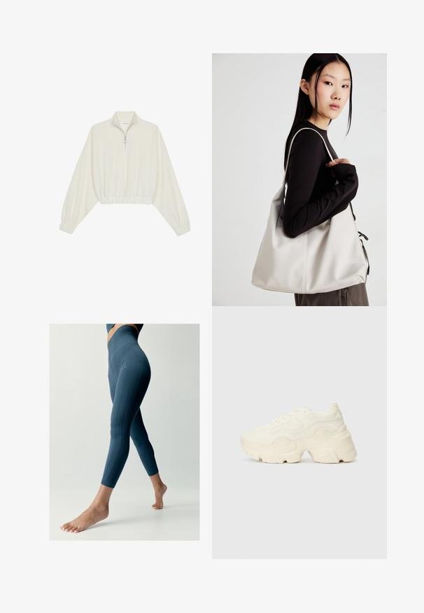 Zkrátený pulover z krémového materiálu, s vysokým golierom, polovičným zipsom, elastickým lemom a manžetami, s hladkou textúrou a minimalistickým dizajnom.; Vysoké, priliehavé legíny v hlbokej tyrkysovej farbe s rebrovanými detailmi po stranách a hladkou, elastickou textúrou.; Masívne biele tenisky vyrobené z texturovanej sieťoviny a syntetických materiálov, s hrubou podošvou a zložitými vzorovými detailmi na bokoch.; Béžová kabelka vyrobená z mäkkého materiálu, s uvoľneným dizajnom, prišitými detailmi a dvoma popruhmi na nosenie na pleciach. Vhodná na každodenné nosenie.