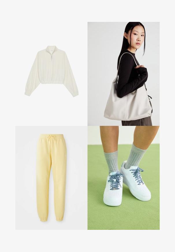 Pullover curto em tecido creme, apresentando um colarinho alto, fecho de meio zíper, bainha e punhos elásticos, com uma textura suave e design minimalista.; Calças de moletom amarelas com cintura elástica e cordão. Apresenta um logótipo branco no lado esquerdo e punhos elásticos nos tornozelos.; Sapatilhas de couro brancas com detalhes azuis, design de biqueira perfurada e atacadores texturizados azul e branco, usadas com meias cinzas caneladas.; Uma bolsa bege feita de material macio, com um design descontraído, detalhes de costura e duas alças para o ombro. Adequada para uso diário.