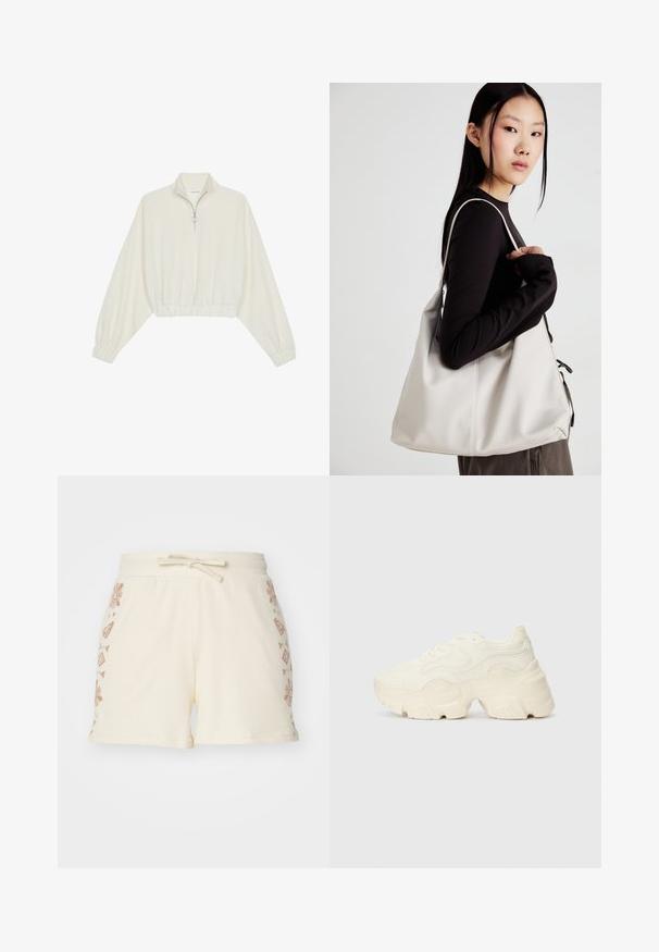 Zkrátený pulover z krémového materiálu, s vysokým golierom, polovičným zipsom, elastickým lemom a manžetami, s hladkou textúrou a minimalistickým dizajnom.; Krémové rebrované šortky s viazaním v páse, na bokoch s dekoratívnymi hnedými kvetinovými a geometrickými vzormi.; Masívne biele tenisky vyrobené z texturovanej sieťoviny a syntetických materiálov, s hrubou podošvou a zložitými vzorovými detailmi na bokoch.; Béžová kabelka vyrobená z mäkkého materiálu, s uvoľneným dizajnom, prišitými detailmi a dvoma popruhmi na nosenie na pleciach. Vhodná na každodenné nosenie.