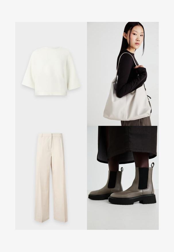 White cropped sweater with short sleeves, round neckline, and smooth texture. Simple design without patterns or accents.; Beige wide-leg trousers with a tailored fit, made from smooth fabric. Features a flat front and clean lines, with no visible embellishments.; Gray ankle boots made of textured leather with elastic side panels and a chunky black sole. Features pull tabs for easy wear.; Beige handbag made of soft material, featuring a slouchy design, stitched detailing, and two shoulder straps. Suitable for everyday use.