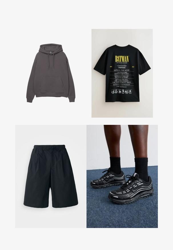 Felpa grigia in cotone con tasca frontale, cappuccio regolabile con lacci, polsi e orlo a costine. Design semplice, texture morbida e vestibilità rilassata.; T-shirt nero a maniche corte con testo bianco che elenca i film di Batman dal 1966 al 2022, con un grande logo giallo "BATMAN" sopra.; Pantaloni corti neri con fascia elastica in vita e cordino regolabile. Realizzati in un tessuto liscio, presentano una vestibilità ampia e senza motivi visibili.; Le scarpe Nike nere presentano una tomaia in mesh con strisce a contrasto, lacci testurizzati e una suola in gomma nera. Indossate con calze nere a costine.