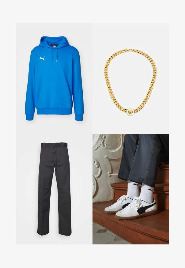 Felpa con cappuccio blu in tessuto morbido, con logo Puma bianco sul petto, tasca frontale a marsupio e polsini e orlo a coste.; Pantaloni neri realizzati in tessuto resistente, con un design a gamba dritta, una cintura con passanti per la cintura e cuciture per una maggiore texture.; Sneakers Puma in suede bianco e nero, con suola in gomma marrone. Abbinati a calzini bianchi con logo nero, indossati con pantaloni scuri.; Collana in oro con grandi anelli intrecciati, caratterizzata da un dettaglio pendente circolare al centro con un emblema in rilievo.