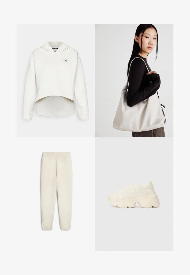 Hanorac alb texturat cu un gât larg, tiv scurt și mâneci lungi. Prezintă un logo subtil verde pe pieptul stâng.; Pantaloni de trening bej deschis, fabricați dintr-un material moale, cu un tiv elastic la talie, glezne strânse și un mic logo alb pe lateral.; Tenisi albi voluminoși, fabricați din plasă texturată și materiale sintetice, cu o talpă groasă și detalii de model intricate pe laturi.; Geantă bej din material moale, cu un design lejer, detalii cusute și două bretele pentru umăr. Potrivită pentru utilizarea zilnică.