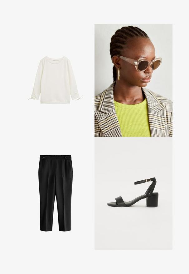 Balts garām piedurknēm tops ar teksturētu virsmu, apaļu kakla izgriezumu un saitēm pie piedurknēm. Vienkāršs dizains ar brīvu piegriezumu.; Melnas īsās bikses ar brīvu piegriezumu, elastīgu jostu un divām priekšējām kabatām. Audumam ir gluda tekstūra ar vieglu spīdumu.; Melnas papēžu sērijas sandales ar gludu ādas virsmojumu, atvērtu pirkstu, platām priekšējām siksnām un regulējamu potītes siksnu ar zelta sprādzi.; Caurspīdīgas kaķacis saulesbrilles ar brūnām lenso. Modele vilkusi zaļu ribotu topu un šķērsota bleizeri. Zelta riņķa auskari.