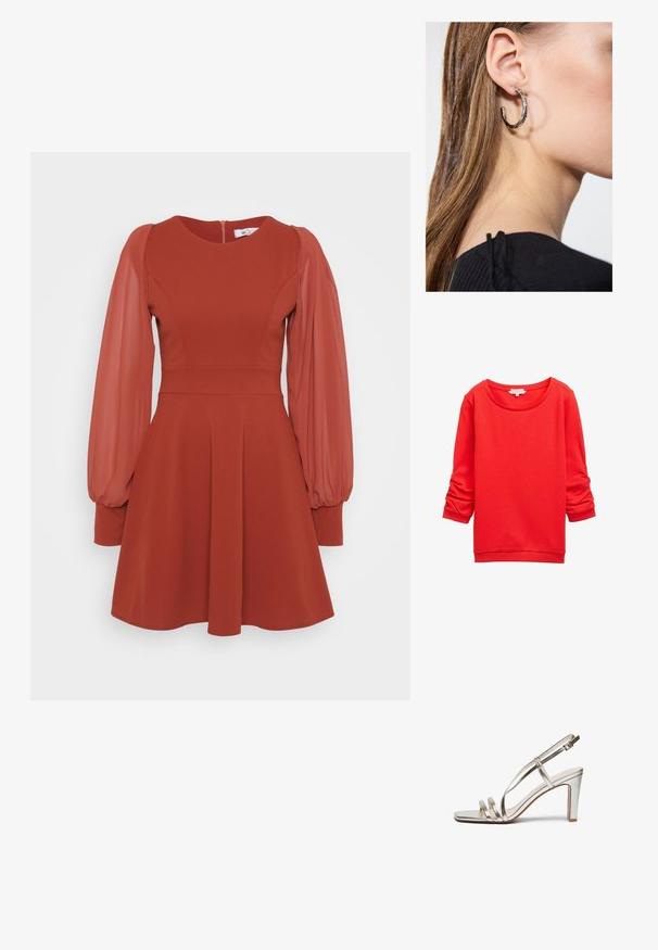 Raudona džemperis su apvaliu iškirpimu, ilgomis rankovėmis, turinčiomis susiraukšlėjimo detalių, ir tekstūruoto audinio raštu. Šonkačių rankogaliai ir apačia.; Raudona suknelė su trumpomis pūstomis permatomomis rankovėmis, prigludusiu liemeniu, plačiu sijonu ir užtrauktuku nugaroje. Pagaminta iš tekstūruoto audinio su lygiu paviršiumi.; Metallic sidabriniai aukštakulniai sandalai su atvira nosimi, turintys tris plonas dirželius per pėdą ir kulkšnies dirželį su sagtimi.; Auksinės metalinės rankinės su lygiu paviršiumi, kuri turi trikampio formos užsegimą. Ranką laikančioji turi tvarkingai prižiūrėtus nagus.; Sidabrinė lankinė auskarai su poliruotu paviršiumi, turintys mažus auksinius akcentus ir apvalią formą, dėvimi ant ausies kaušelio.