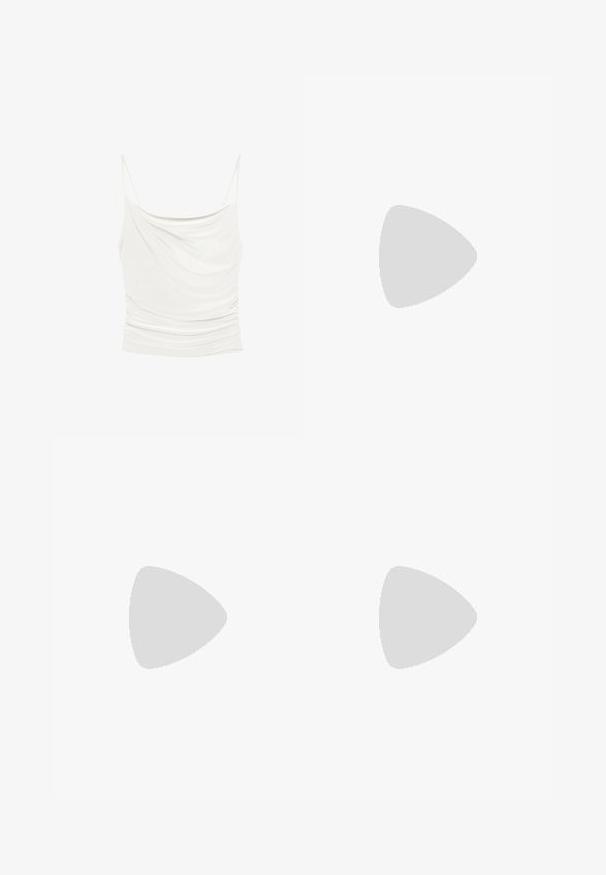 White sleeveless top with thin straps, featuring a draped design and gathered texture along the sides, made from soft fabric.; Long, draped skirt made of layered, textured fabric in warm tones of yellow, orange, and brown. Features a decorative beaded belt.; Beige synthetic slingback high-heeled shoe with a pointed toe, wide block heel, and contrasting black buckle detail on the vamp.; Brown leather handbag with a rounded shape, featuring a buckle detail and long fringe accents along the bottom. Gold-tone hardware.