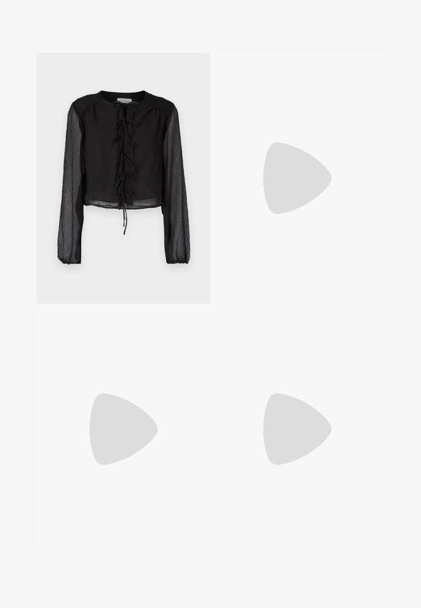 Black cropped blouse made of textured fabric, featuring long sheer sleeves, a round neckline, and a front lace-up detail.; Black pleated trousers with a straight cut. Made of smooth fabric, featuring a flat waistband and side pockets. Minimalist design, no patterns.; Black leather ankle boots with a pointed toe and block heel, paired with shiny silver pants, showcasing sleek textures and contrasting colors.; Black leather bucket bag with a textured finish, gold hardware accents, and an open top. Features a short handle and adjustable shoulder strap.