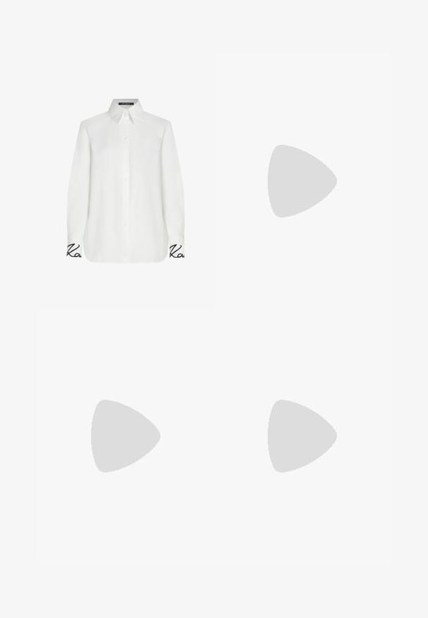 White long-sleeve shirt with a button-down collar, featuring a relaxed fit and black embroidered accent on the cuffs. Smooth texture.; Black trousers featuring a straight cut, smooth texture, and a waistband with a single button closure. No visible patterns or accents.; Black leather slingback heels with a pointed toe, slender heel, and decorative buckle detail on the vamp. Smooth texture and sleek design.; Beige leather handbag with a structured, triangular shape, featuring a silver chain handle and a cursive logo in metal.