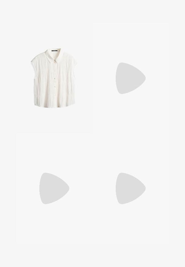 Blusa bianca a maniche corte con colletto, caratterizzata da un motivo a pieghe texturizzato e chiusura frontale con bottoni.; Pantaloni larghi marroni realizzati in tessuto morbido, con vita elastica e cordoncino, e due tasche laterali.; Sneakers in suede marrone con strisce in pelle bianca, suola in gomma, punta rotonda e lacci. Presentano un logo sulla linguetta e dettagli perforati.; Borsa tote in pelle marrone con texture liscia, design con apertura superiore e due spallacci. Presenta cuciture minime e nessun hardware visibile.