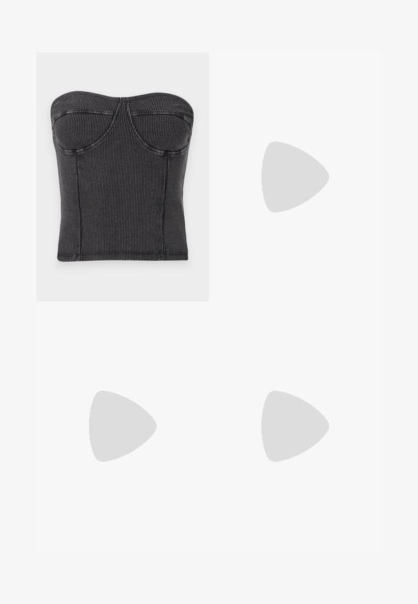 Black strapless top made of ribbed fabric, featuring a fitted design, curved seams, and a smooth texture. No visible fastenings or embellishments.; Black high-waist jeans with a button and zip closure, front pockets, and flared legs laid flat on a white background.; Silver slingback high heel shoe with a pointed toe, metallic finish, two decorative straps, and a slender heel with a black tip.; Silver metallic handbag with a structured shape, featuring a top handle and bow detail on the front. Smooth texture, reflective finish.