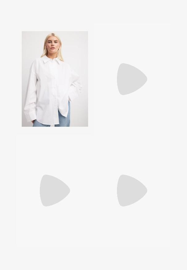 NA-KD WIDE SLEEVE OVERSIZED  - Camicia - white; Pantaloni culotte neri in poliestere con una cintura elastica, due pieghe frontali e una silhouette ampia. Nessun motivo visibile o dettagli in metallo.; Sandali con tacco in vernice nera, con punta squadrata, cinturini alla caviglia e fibbie in argento. Presentano un tacco a blocco spesso per maggiore stabilità.; Borsa tote in pelle nera con texture liscia, forma rettangolare e due manici lunghi. Nessun hardware o decorazione visibile.