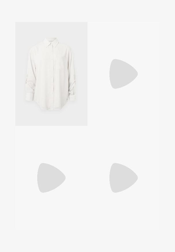 White button-up shirt made of lightweight fabric, featuring a chest pocket, long sleeves with roll-up tabs, and a curved hemline.; Black tailored trousers with a straight-leg design, featuring a smooth texture and crisp creases along the front. No visible hardware.; Black leather slingback heels with a pointed toe, featuring a slim heel and a gold-tone accent on the adjustable strap. Smooth texture.; Black leather handbag with a structured design, featuring a cropped shape, top handle, and gold hardware accent. Adjustable shoulder strap included.