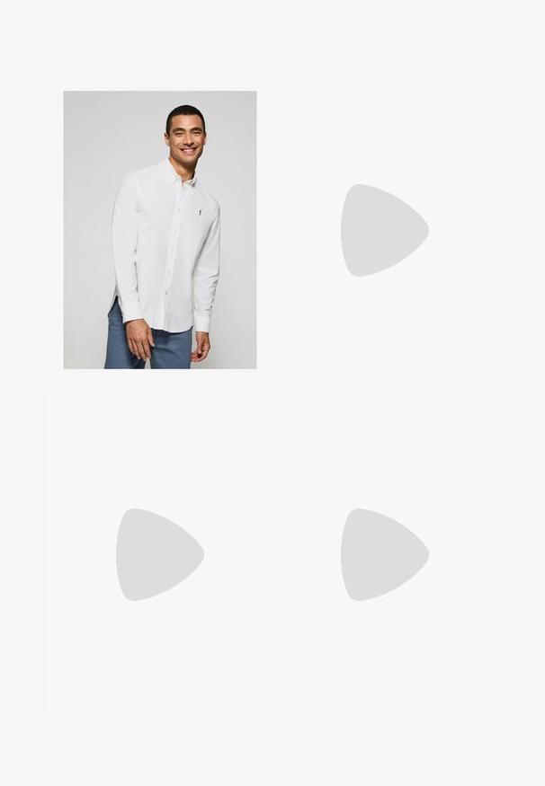 Wit overhemd met lange mouwen en knopen, voorzien van een klein logo op de borst, gecombineerd met lichtblauwe broek. Gladde stof met een klassieke kraag.; Zwarte T-shirt met korte mouwen en een klein, gecentreerd Adidas trefoil logo op de borst, weergegeven tegen een eenvoudige witte achtergrond.; Zwarte cargobroeken met een elastische tailleband, voorzien van zijzakken, een losse pasvorm en een gestructureerde stof. Ontworpen voor comfort en functionaliteit.; Grijze sportschoen met een gestructureerde mesh bovenkant, transparante accenten en drie zilveren strepen. Beschikt over een gevoerde zool en rubberen buitenzool.