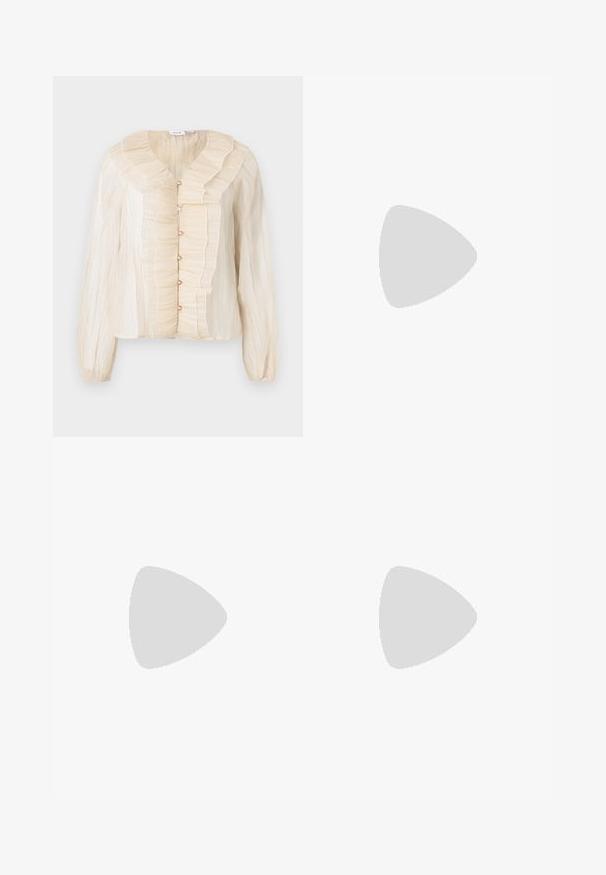 Cream-colored blouse with ruffled neckline and front, button closures, long sleeves, and soft texture. Accents in matching tone.; Dark blue wide-leg jeans with high waist, gold button accents, two front and back pockets, and contrasting stitch details. Textured denim fabric.; Black leather loafers with a tied bow, featuring gold eyelet accents along the sides and a flat rubber sole. Smooth texture, classic design.; Black faux leather handbag with a crocodile texture, cinched top, and a scrunched strap. Appears soft and compact in design.