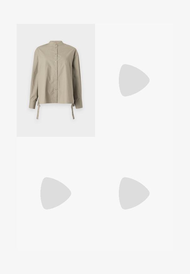 Beige button-up shirt with a mandarin collar, long sleeves, and side ties. Made of smooth fabric, featuring a relaxed fit and simple design.; Dark denim skirt with a straight cut, featuring two front pockets and subtle texture. Clean hemline and standard waistband design.; Black leather high-heeled shoes with a pointed toe and open design featuring a decorative silver accent. Smooth texture with polished finish.; Brown crocodile-embossed leather bag with a cylindrical shape, gold-tone hardware, and a detachable strap featuring studs.