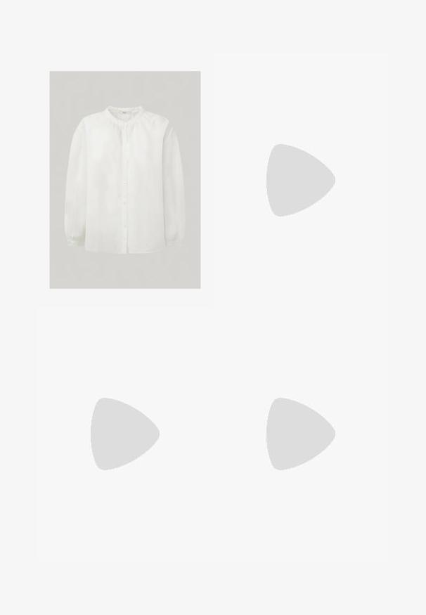 Camicia bianca con colletto rotondo, maniche lunghe e dettagli arricciati sulle spalle. Realizzata in tessuto leggero, con una texture liscia.; Pantaloni a gamba larga marroni con una texture liscia, dotati di una cintura nera in vita e tasche laterali. Design sartoriale e vestibilità rilassata.; Scarpa slingback in pelle verniciata marrone con punta affusolata e tacco moderato. Presenta una fascia con fibbia per una calzata sicura. Tessuto liscio.; Occhiali da sole in tartaruga con una montatura rotonda e voluminosa e lenti marroni. Presentano delicati motivi e bracci dritti e affusolati.