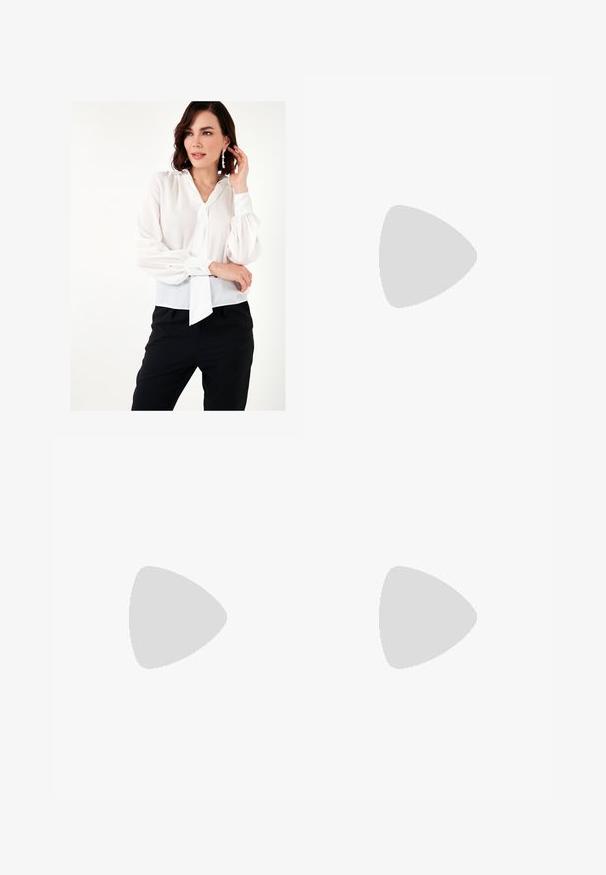 White, sheer blouse with balloon sleeves, a neckline bow tie, and buttoned cuffs, paired with black pants. Smooth texture.; A knee-length skirt in a light fabric with a beige, brown, and green abstract pattern. Features a fitted waistband and flowing design.; Pink suede high-heel sandal with a block heel, open toe, and ankle strap featuring a gold buckle detail. Flat front strap.; Brown faux leather shoulder bag with curved shape, minimal stitching, and a gold-tone hardware accent. Features a top zipper closure and adjustable strap.