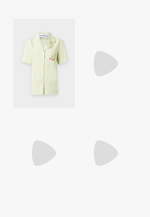 Short-sleeve light green cotton shirt with pink piping, featuring a front pocket adorned with colorful floral embroidery and five buttons.; Black wide-leg trousers made of a smooth fabric, featuring a front button closure, two side pockets, and deep pleats.; Black patent leather slingback heels with a pointed toe and a small block heel, featuring a silver buckle accent on the strap.; Black leather handbag with a curved shape, detachable strap, and gold hardware. The bag features a flap with a buckle detail.