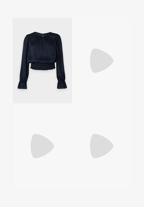Blusa de satén azul marino con cuello redondo, mangas largas abullonadas, cintura fruncida y dobladillo con volantes. Presenta un pequeño detalle de botón en el collar.; Falda blanca plisada con una cinturilla elástica negra que presenta el logotipo "LACOSTE". Diseño de longitud media con textura suave.; Zapatillas blancas de cuero con una suela blanca gruesa, acento en el talón de ante negro y logo grabado en el lateral. Diseño de cordones con seis ojales.; Gafas de sol negras de gran tamaño con una forma geométrica, que presentan lentes oscuros y un detalle gris contrastante en la montura. Logo en la pata.