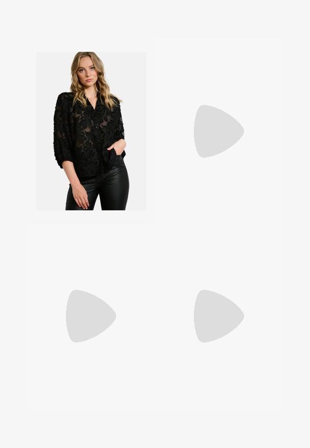 Black sheer blouse featuring textured floral patterns, a collared neckline, and button closure. Styled with fitted black pants.; Black flared trousers with a high waist; features two front pockets and a smooth fabric texture. Suitable for various occasions.; Black patent leather slingback heels with a pointed toe and a geometric block heel. Features a sleek, minimal design and smooth texture.; Black leather hobo bag with a smooth texture, curved shape, and single adjustable strap; features a wide opening at the top.