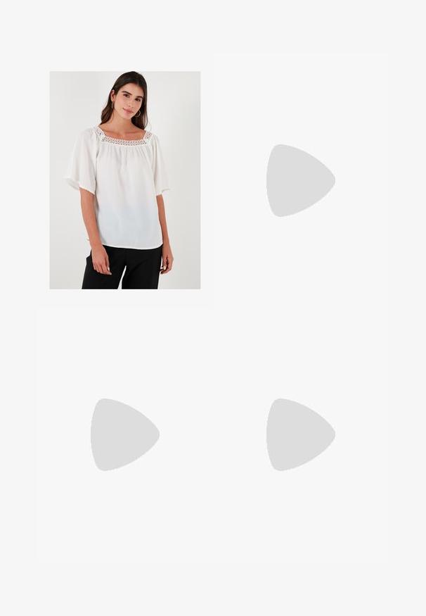 White blouse featuring short flutter sleeves, a square neckline adorned with crochet detailing, and lightweight, textured fabric.; A knee-length skirt in a light fabric with a beige, brown, and green abstract pattern. Features a fitted waistband and flowing design.; Pink suede high-heel sandal with a block heel, open toe, and ankle strap featuring a gold buckle detail. Flat front strap.; Brown faux leather shoulder bag with curved shape, minimal stitching, and a gold-tone hardware accent. Features a top zipper closure and adjustable strap.