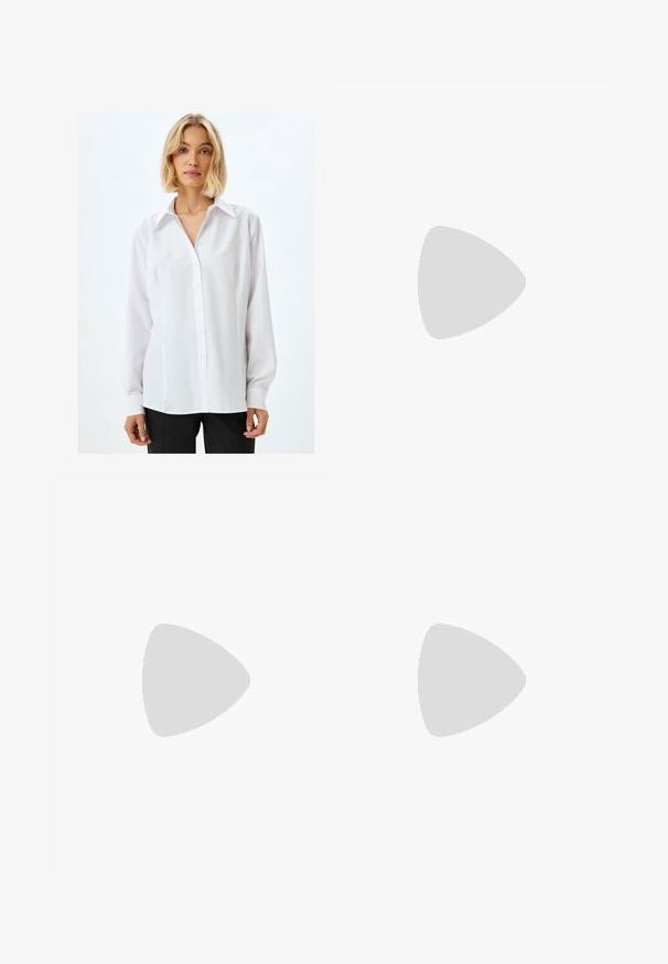 Vit långärmad skjorta med knapplåstning och krage, tillverkad av ett mjukt tyg, med rak passform och minimalistisk design.; Bershka Flared jeans - black; Svarta mockaskor med vita snören och tre vita ränder. Har en rund svart logotyp på tungan och en gumminnedgummisula.; Överdimensionerade sköldpaddsmönstrade solglasögon med gradientlinser, svart tjock ram, i kombination med en mörk texturerad kappa och sidenblus.
