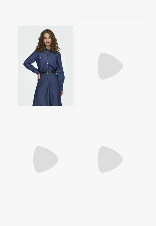 Camicia di denim blu scuro, con chiusura a bottoni, due tasche sul petto e maniche lunghe. Indossata con una cintura nera sopra una gonna coordinata.; Pantaloni larghi blu navy in tessuto morbido, con pieghe frontali, passanti per cintura e tasche laterali. Include una chiusura a bottone in vita.; Scarpe sportive con tomaia in pelle bianca, punta in suede grigia e tre strisce nere. Presentano un logo blu sulla linguetta e una suola in gomma testurizzata.; Borsa a tracolla in pelle bordeaux con forma curvata, una sola tracolla e dettagli cuciti al centro. Texture liscia, hardware minimale.