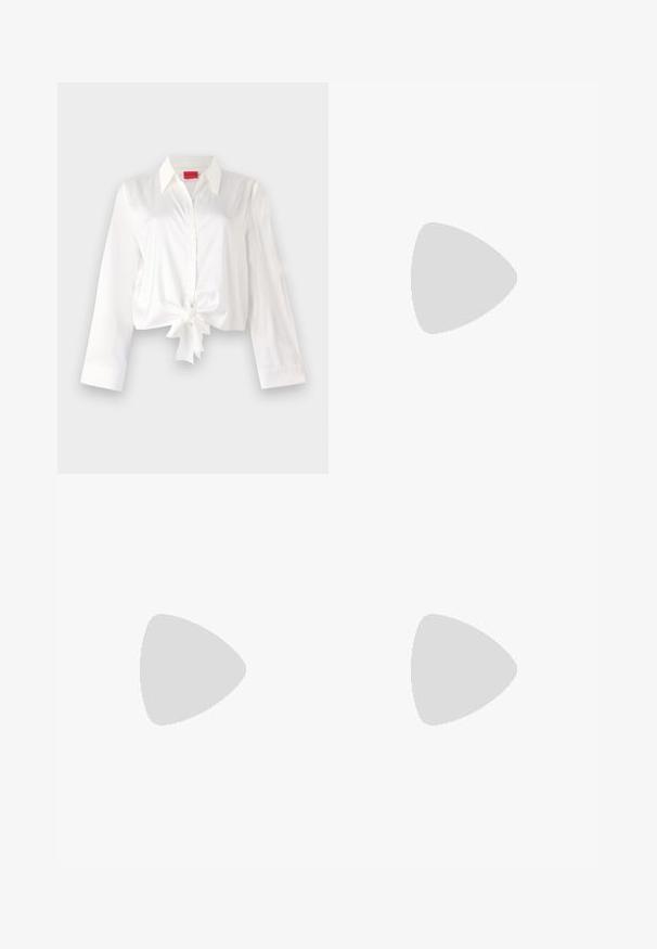 Cropped, long-sleeve button-up shirt in white satin fabric, featuring a front tie detail and classic collar. Smooth texture and fitted design.; Black tailored trousers with a straight-leg design, featuring a smooth texture and crisp creases along the front. No visible hardware.; Black leather slingback heels with a pointed toe, featuring a slim heel and a gold-tone accent on the adjustable strap. Smooth texture.; Black leather handbag with a structured design, featuring a cropped shape, top handle, and gold hardware accent. Adjustable shoulder strap included.