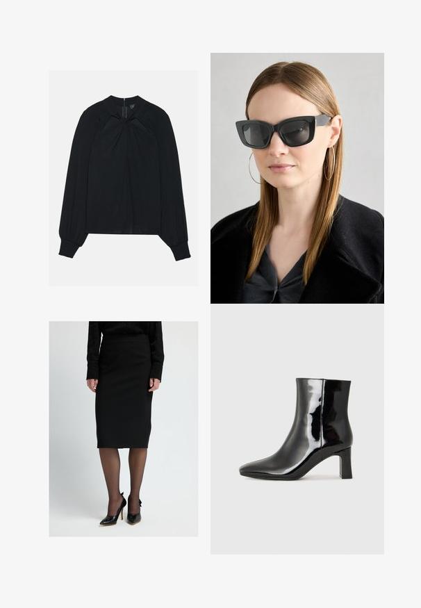 Zwarte blouse van lichtgewicht stof met een geplooide voorkant, hoge kraag en elastische manchetten met een verborgen ritssluiting aan de achterkant.; Zwarte kokerrok met een gladde textuur, gecombineerd met zwarte hoge hakken met een strikaccent aan de achterkant. Transparante zwarte tights maken de look compleet.; Zwarte gepolijste leren enkellaars met een spitse neus en een blokhak van gemiddelde hoogte. Glad textuur en minimalistisch ontwerp.; Zwarte cat-eye zonnebril met donkere lenzen, dikke monturen en subtiele accenten. Draagt een zwarte jas en een grijze top, met lang stijl haar.